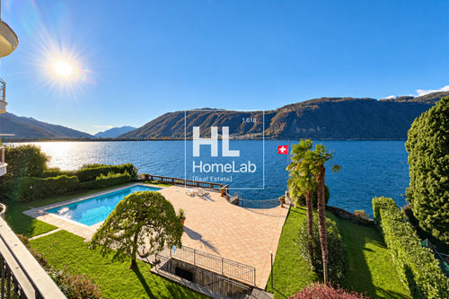 APPARTAMENTO FRONTE LAGO CON TERRAZZA, PISCINA E POSTO BARCA A BISSONE