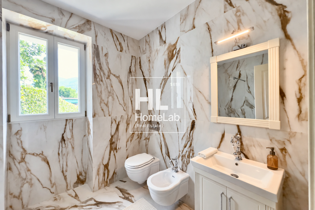HISTORIC RENOVATED VILLA WITH PANORAMIC TERRACE IN LUGANO